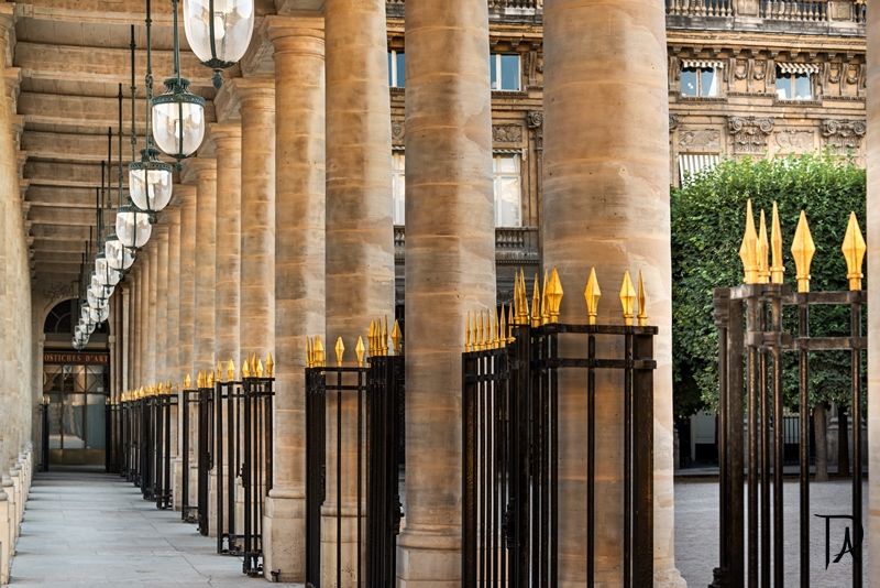 Under the arcade of the Palais Royal Under the arcade of the Palais Royal